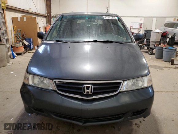 2003 Honda Odyssey EX with VIN 2HKRL18603H008412, listed as a Copart auction lot 87502365 with 352,773 mi miles and Salvage Title. Bid and sale history available at DreamBid. Image 5.