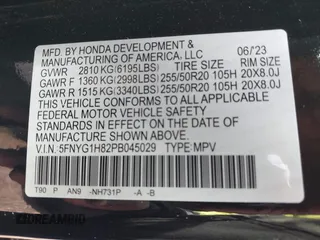2023 Honda Pilot Elite z VIN 5FNYG1H82PB045029, wystawiony jako IAAI lot #41779289 z przebiegiem 27 484 mil mil oraz . Historia ofert i sprzedaży dostępna na DreamBid. Obrazek 9.