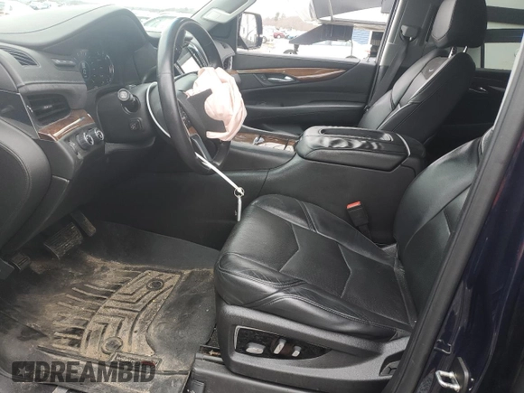 2017 Cadillac Escalade Luxury with VIN 1GYS4BKJ2HR236875, listed as a Copart auction lot 52328095 with 103,335 mi miles and Salvage title. Bid and sale history available at DreamBid. Image 7.