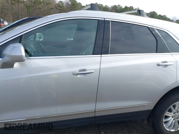 2019 Cadillac XT5 FWD z VIN 1GYKNARS9KZ244873, wystawiony jako IAAI lot #41164998 z przebiegiem 26 314 mil mil oraz . Historia ofert i sprzedaży dostępna na DreamBid. Obrazek 14.