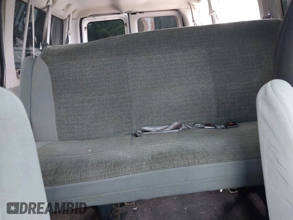 2003 Ford Econoline Passenger XL with VIN 1FBNE31L63HA12648, listed as a IAAI auction lot 41763111 with 592,494 mi miles and . Bid and sale history available at carsss.com. Image 8.