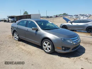 2012 Ford Fusion SE z VIN 3FAHP0HA4CR232641, wystawiony jako IAAI lot #42057070 z przebiegiem 180 793 mil mil oraz . Historia ofert i sprzedaży dostępna na DreamBid. Obrazek 1.