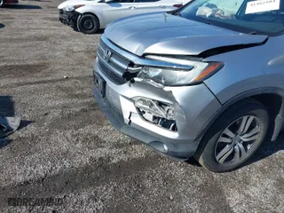 2016 Honda Pilot EX-L with VIN 5FNYF6H50GB092999, listed as a IAAI auction lot 41462504 with 141,604 mi miles. Bid and sale history available at carsss.com. Image 6.