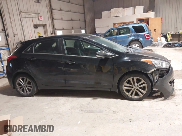 2016 Hyundai Elantra GT with VIN KMHD35LH2GU266352, listed as a IAAI auction lot 41754614 with 155,650 mi miles. Bid and sale history available at carsss.com. Image 13.