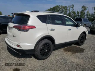 2016 Toyota RAV4 Limited with VIN JTMDFREV9GJ066429, listed as a Copart auction lot 61874995 with 77,686 mi miles and Salvage title. Bid and sale history available at DreamBid. Image 3.