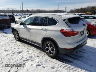 2017 BMW X1 xDrive28i with VIN WBXHT3C33H5F77000, listed as a Copart auction lot 41860993 with 113,553 mi miles. Bid and sale history available at carsss.com. Image 2.