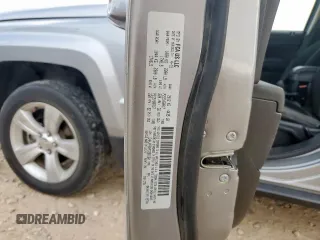 2015 Jeep Patriot Latitude with VIN 1C4NJPFBXFD368160, listed as a Copart auction lot 59235425 with 105,529 mi miles and Salvage title. Bid and sale history available at DreamBid. Image 13.