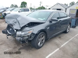 2015 Ford Taurus SEL with VIN 1FAHP2E81FG163058, listed as a IAAI auction lot 42221098 with 127,957 mi miles and . Bid and sale history available at carsss.com. Image 17.