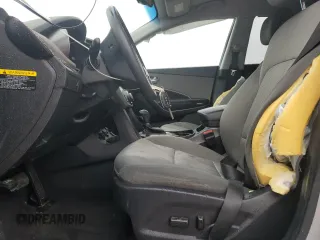 2017 Hyundai Santa Fe 2.4L z VIN 5XYZUDLB8HG500297, wystawiony jako Copart lot #58005165 z przebiegiem 91 871 mil mil oraz Szkoda całkowita • Salvage title. Historia ofert i sprzedaży dostępna na DreamBid. Obrazek 7.