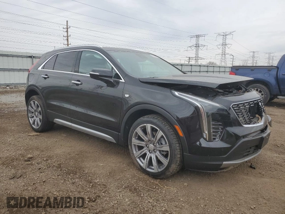 2022 Cadillac XT4 AWD Premium Luxury with VIN 1GYFZDR43NF132553, listed as a Copart auction lot 50869955 with 25,412 mi miles and Salvage title. Bid and sale history available at DreamBid. Image 4.