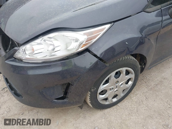 2013 Ford Fiesta S z VIN 3FADP4AJ9DM175576, wystawiony jako IAAI lot #42449969 z przebiegiem 123 959 mil mil oraz . Historia ofert i sprzedaży dostępna na DreamBid. Obrazek 12.