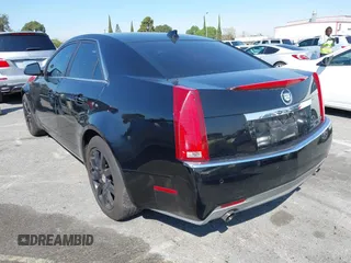2009 Cadillac CTS RWD w/1SA with VIN 1G6DF577090106108, listed as a IAAI auction lot 41850732 with 202,362 mi miles. Bid and sale history available at carsss.com. Image 3.