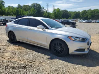 2015 Ford Fusion SE z VIN 3FA6P0H70FR265071, wystawiony jako Copart lot #55843685 z przebiegiem 137 104 mil mil oraz Szkoda całkowita • Salvage title. Historia ofert i sprzedaży dostępna na DreamBid. Obrazek 4.