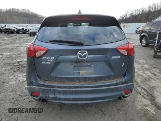 2013 Mazda CX-5 Touring with VIN JM3KE4CE7D0126460, listed as a Copart auction lot 46730785 with 0 mi miles and Salvage Title. Bid and sale history available at carsss.com. Image 6.