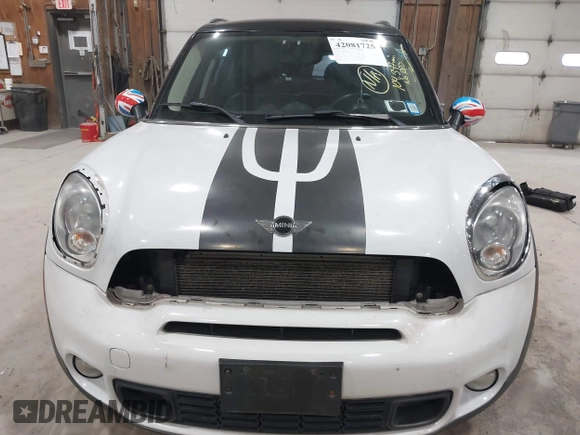 2012 MINI Countryman S with VIN WMWZC5C58CWL60067, listed as a IAAI auction lot 42081725 with 104,397 mi miles and . Bid and sale history available at DreamBid. Image 6.