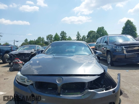 2015 BMW M4 with VIN WBS3U9C5XFJ967725, listed as a IAAI auction lot 42593444 with Not provided miles and . Bid and sale history available at DreamBid. Image 13.