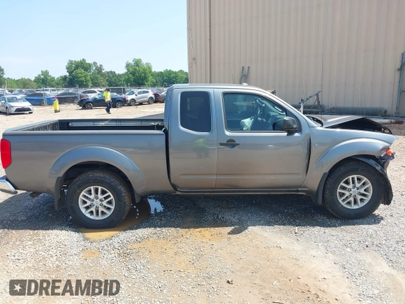 2016 Nissan Frontier SV z VIN 1N6AD0CW0GN760285, wystawiony jako IAAI lot #42434781 z przebiegiem 52 864 mil mil oraz . Historia ofert i sprzedaży dostępna na DreamBid. Obrazek 13.