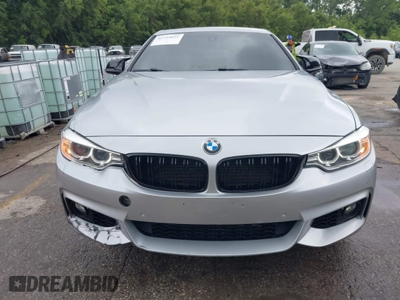 2016 BMW 4 Series 428i xDrive z VIN WBA4C9C57GG137858, wystawiony jako IAAI lot #42755021 z przebiegiem 92 728 mil mil oraz . Historia ofert i sprzedaży dostępna na DreamBid. Obrazek 13.
