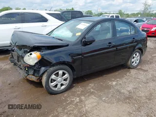 2006 Hyundai Accent GLS z VIN KMHCN46C76U038040, wystawiony jako IAAI lot #42220455 z przebiegiem 140 413 mil mil oraz . Historia ofert i sprzedaży dostępna na DreamBid. Obrazek 18.