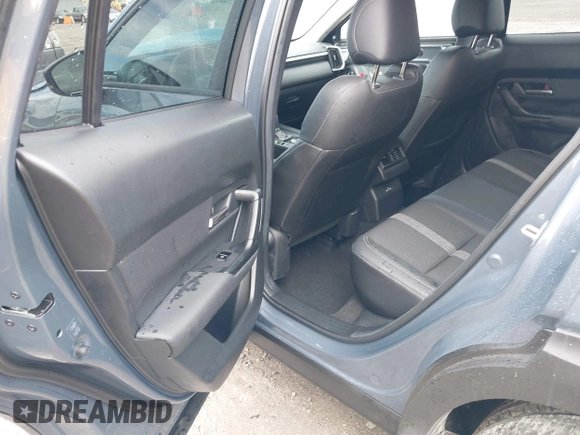 2024 Mazda CX-50 S Select with VIN 7MMVABAM9RN203355, listed as a IAAI auction lot 40399675 with 5,415 mi miles and . Bid and sale history available at DreamBid. Image 8.
