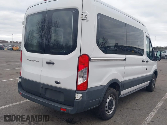 2016 Ford Transit Cargo with VIN 1FTYR1CM5GKA27058, listed as a IAAI auction lot 41753527 with 112,824 mi miles and . Bid and sale history available at DreamBid. Image 4.