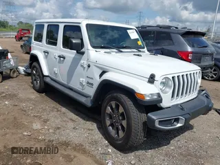 2018 Jeep Wrangler Unlimited Sahara z VIN 1C4HJXEG1JW205789, wystawiony jako IAAI lot #42435877 z przebiegiem 57 587 mil mil oraz . Historia ofert i sprzedaży dostępna na DreamBid. Obrazek 1.