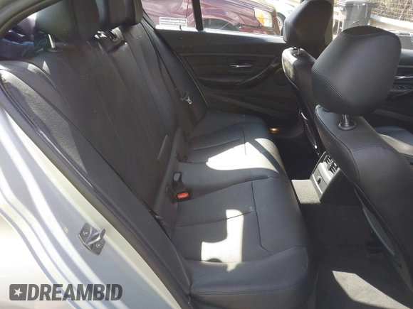 2015 BMW 3 Series 328i with VIN WBA3A5G54FNS83410, listed as a IAAI auction lot 41942681 with 115,340 mi miles. Bid and sale history available at carsss.com. Image 8.