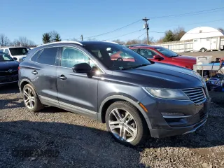 2015 Lincoln MKC with VIN 5LMTJ2AH0FUJ10888, listed as a Copart auction lot 48795445 with 123,437 mi miles and Salvage Title. Bid and sale history available at carsss.com. Image 4.