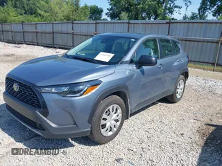 2022 Toyota Corolla Cross L with VIN 7MUAAABGXNV035110, listed as a IAAI auction lot 42562359 with 17,106 mi miles and . Bid and sale history available at DreamBid. Image 2.