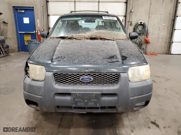 2003 Ford Escape XLS Popular with VIN 1FMYU92103KA03082, listed as a Copart auction lot 85186524 with 216,071 mi miles and Clean Title. Bid and sale history available at carsss.com. Image 5.