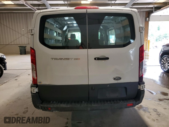 2018 Ford Transit z VIN 1FTYR1YM3JKA92605, wystawiony jako Copart lot #57334985 z przebiegiem 61 538 mil mil oraz Szkoda całkowita • Salvage title. Historia ofert i sprzedaży dostępna na DreamBid. Obrazek 6.