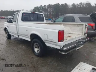 1994 Ford F-150 with VIN 1FTEF15N0RNA67826, listed as a IAAI auction lot 41547971 with 233,713 mi miles. Bid and sale history available at carsss.com. Image 3.