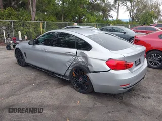 2015 BMW 4 Series 435i with VIN WBA4B1C58FG241018, listed as a IAAI auction lot 41401671 with 79,369 mi miles. Bid and sale history available at carsss.com. Image 3.