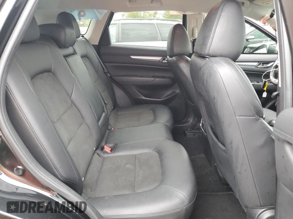 2020 Mazda CX-5 Touring with VIN JM3KFBCM1L0792706, listed as a Copart auction lot 73032144 with 56,845 mi miles and Salvage Title. Bid and sale history available at carsss.com. Image 11.