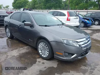 2012 Ford Fusion Hybrid с VIN 3FADP0L33CR289548, выставлен на аукционе IAAI как лот 41905806 с пробегом 121 233 миль миль и . История ставок и продаж доступна на DreamBid. Изображение 1.