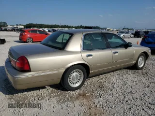 1999 Mercury Grand Marquis LS with VIN 2MEFM75W1XX600671, listed as a Copart auction lot 53323735 with 244,781 mi miles and Salvage Title. Bid and sale history available at DreamBid. Image 3.