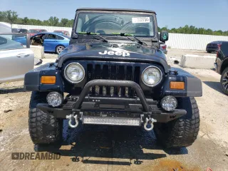 1997 Jeep Wrangler SE with VIN 1J4FY29P2VP431639, listed as a Copart auction lot 61222754 with 225,081 mi miles and Salvage Title. Bid and sale history available at carsss.com. Image 5.