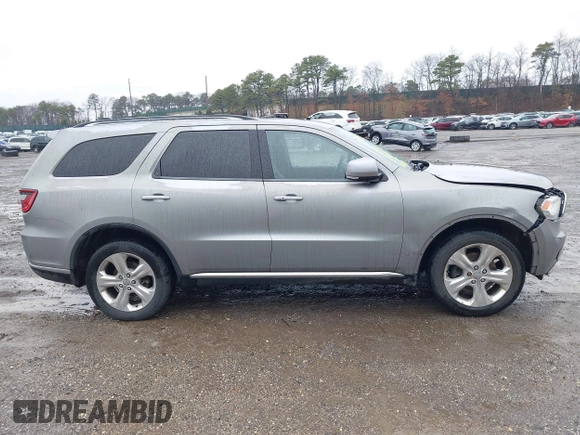 2014 Dodge Durango Limited with VIN 1C4SDJDTXEC286906, listed as a IAAI auction lot 41962120 with 111,309 mi miles and . Bid and sale history available at DreamBid. Image 13.