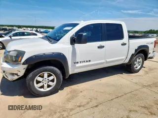 2011 Nissan Titan Pro-4X z VIN 1N6BA0EC0BN301945, wystawiony jako Copart lot #58733695 z przebiegiem 205 752 mil mil oraz Szkoda całkowita • Salvage title. Historia ofert i sprzedaży dostępna na DreamBid. Obrazek 1.