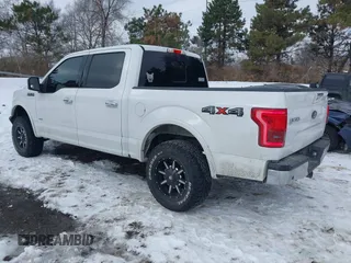 2015 Ford F-150 XLT with VIN 1FTEW1EPXFFA26059, listed as a IAAI auction lot 41348308 with 148,499 mi miles. Bid and sale history available at carsss.com. Image 3.