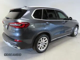 2022 BMW X5 sDrive40i with VIN 5UXCR4C00N9L79444, listed as a Copart auction lot 43563295 with 66,896 mi miles and Clean Title. Bid and sale history available at carsss.com. Image 3.