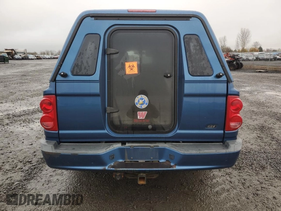 2005 Dodge Dakota Laramie with VIN 1D7HW58N35S225612, listed as a Copart auction lot 83990174 with Not Provided miles and Salvage Title. Bid and sale history available at DreamBid. Image 6.