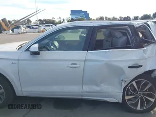 2022 Audi Q5 S line Premium z VIN WA1GAAFY3N2101201, wystawiony jako IAAI lot #41263245 z przebiegiem 28 361 mil mil oraz . Historia ofert i sprzedaży dostępna na DreamBid. Obrazek 13.