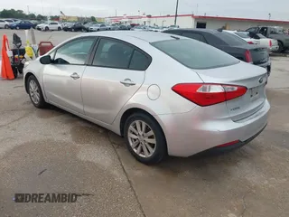 2014 Kia Forte LX with VIN KNAFX4A63E5099825, listed as a IAAI auction lot 42119316 with 174,551 mi miles and . Bid and sale history available at carsss.com. Image 3.