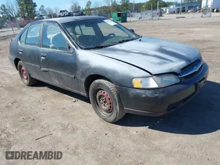 1999 Nissan Altima XE with VIN 1N4DL01D0XC116467, listed as a IAAI auction lot 41705684 with 227,999 mi miles. Bid and sale history available at carsss.com. Image 1.