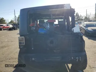2009 Jeep Wrangler Rubicon with VIN 1J4GA64169L765933, listed as a Copart auction lot 84963104 with 107,190 mi miles and Salvage Title. Bid and sale history available at DreamBid. Image 6.