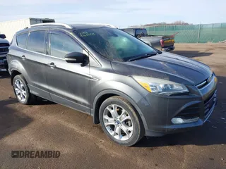 2015 Ford Escape Titanium z VIN 1FMCU9J93FUA72603, wystawiony jako IAAI lot #41631058 z przebiegiem 138 687 mil mil oraz . Historia ofert i sprzedaży dostępna na DreamBid. Obrazek 1.