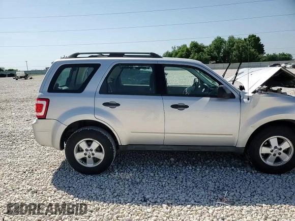 2011 Ford Escape XLS с VIN 1FMCU0C70BKB97667, выставлен на аукционе Copart как лот 52709365 с пробегом 140 582 миль миль и Списание • Salvage title. История ставок и продаж доступна на DreamBid. Изображение 11.