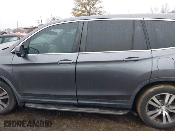 2017 Honda Pilot EX-L with VIN 5FNYF5H8XHB018480, listed as a IAAI auction lot 41049028 with 136,748 mi miles and . Bid and sale history available at DreamBid. Image 15.