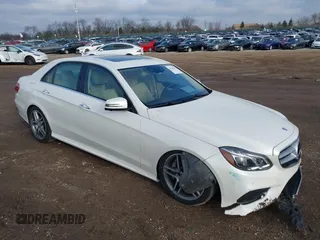 2014 Mercedes-Benz E 550 Sport with VIN WDDHF9BB5EA949457, listed as a IAAI auction lot 41128583 with 99,248 mi miles and . Bid and sale history available at DreamBid. Image 1.